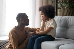 father addressing behavioral concerns of a child