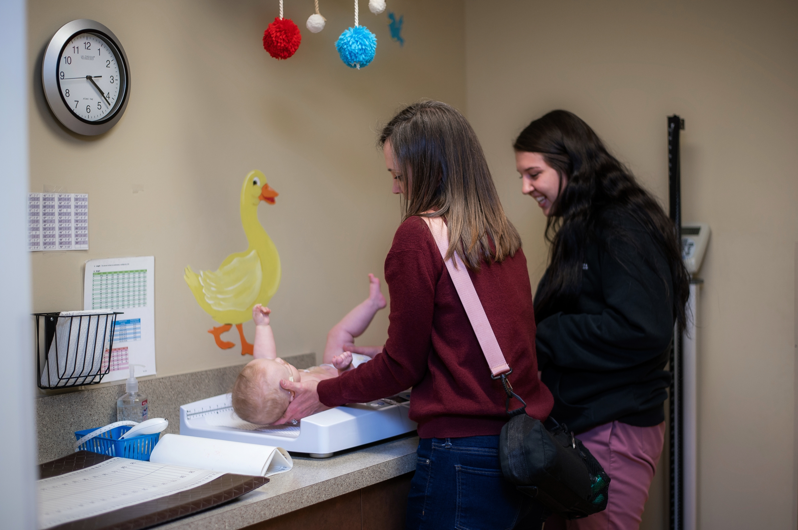 pediatric newborn care, Parker Pediatrics, Parker, Colorado Newborn baby receiving pediatric care from pediatrician.